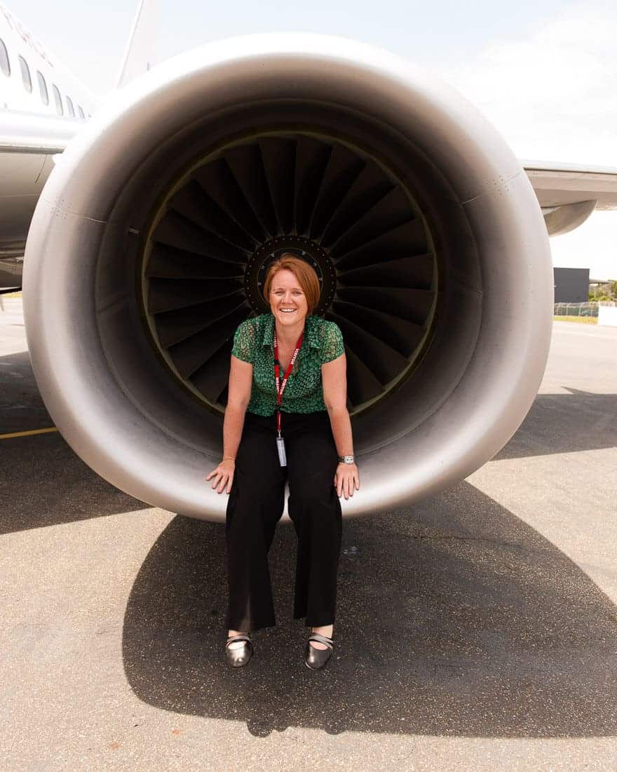 Portrait of Jen Dainer, Commercial, Industrial, Aviation Photographer and Video Producer, Brisbane. Sitting inside a jet engine